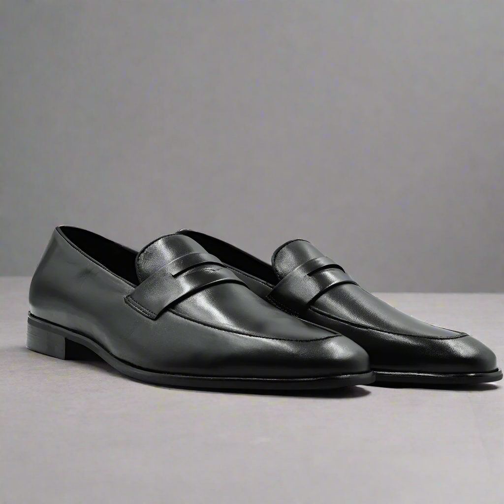 Men's Genuine Leather John Drake Penny Loafer in Black (32683) - Moccasin/Slip-on Shoe available in-store, 337 Monty Naicker Street, Durban CBD or shop online at www.omarstailors.com - Free Shipping.